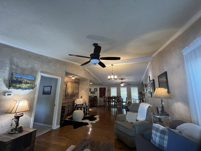 living room with crown molding, ceiling fan, vaulted ceiling, and wood finished floors