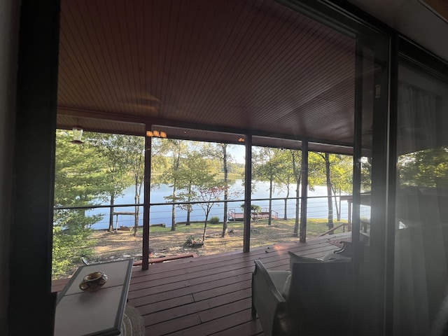 sunroom with a water view