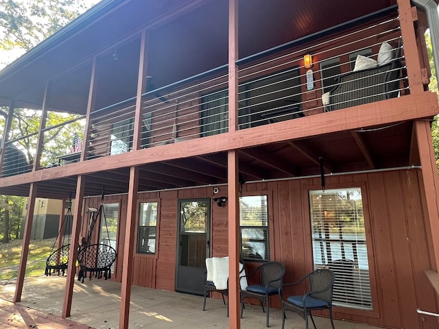 rear view of house featuring a patio