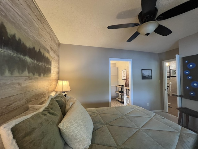 bedroom with wooden walls and ceiling fan