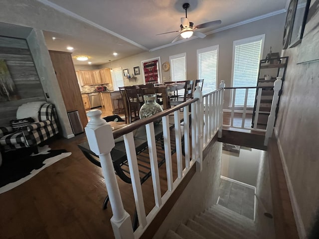 stairway with a ceiling fan, crown molding, wood finished floors, baseboards, and recessed lighting