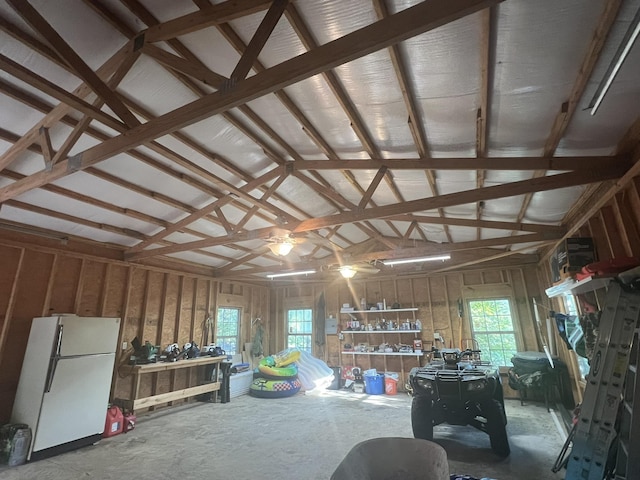 garage with freestanding refrigerator