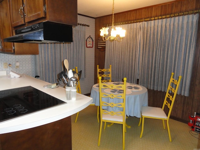 dining room with a notable chandelier