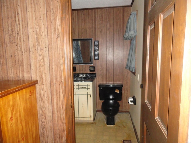 interior space featuring wood walls