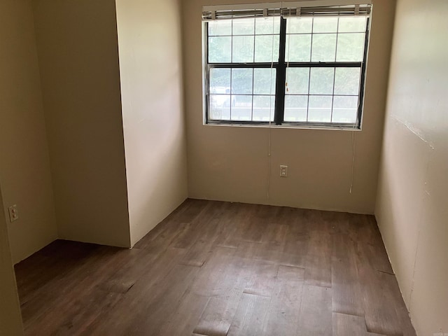 spare room featuring hardwood / wood-style floors