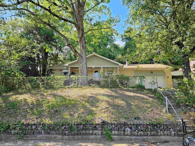 single story home featuring a garage