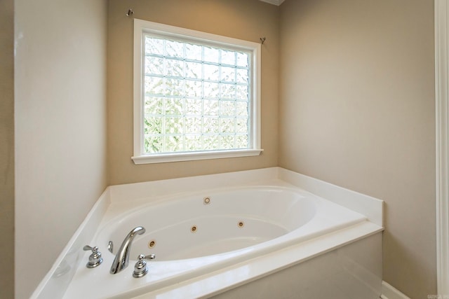 bathroom featuring a tub