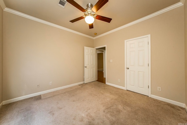 unfurnished bedroom with light carpet, ceiling fan, and crown molding