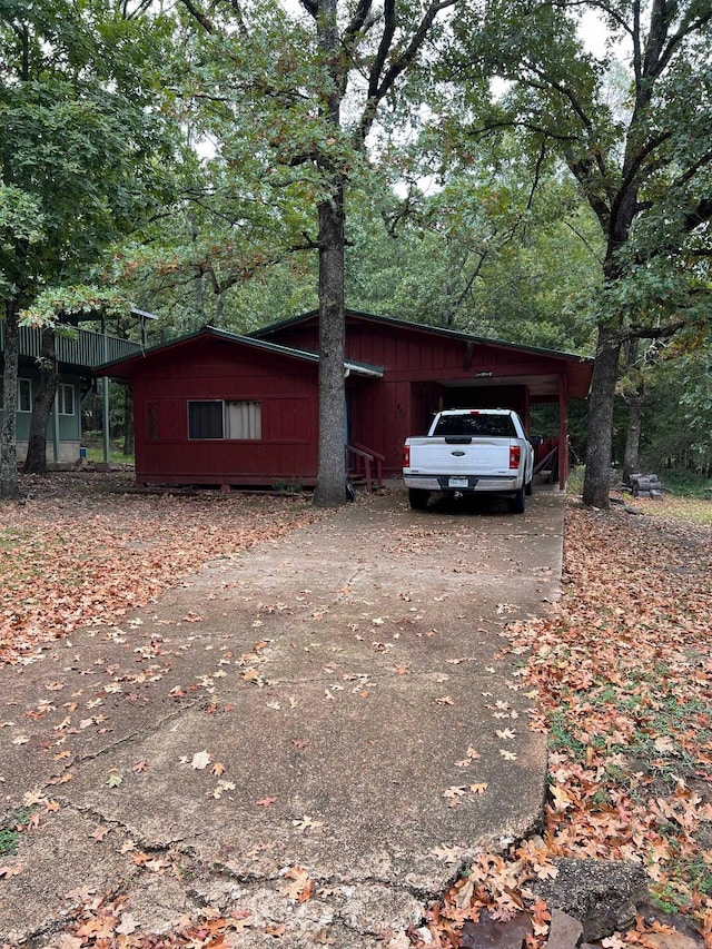 view of front facade with a carport