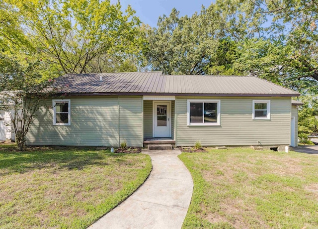 single story home with a front lawn