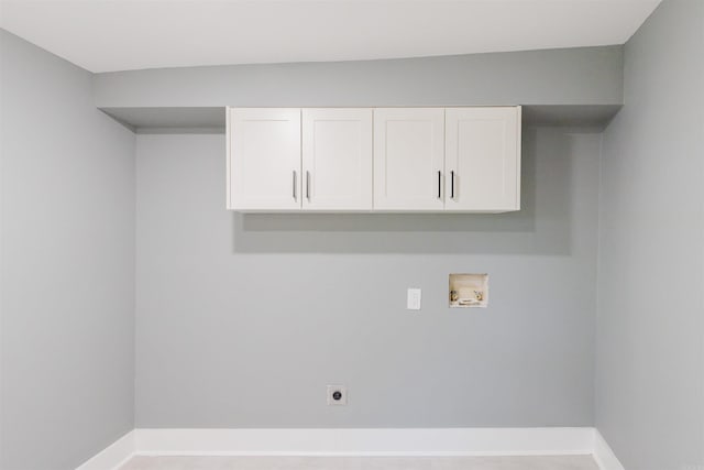 washroom featuring cabinets, hookup for an electric dryer, and hookup for a washing machine