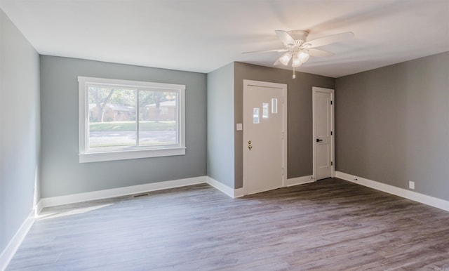 foyer entrance featuring ceiling fan and hardwood / wood-style floors