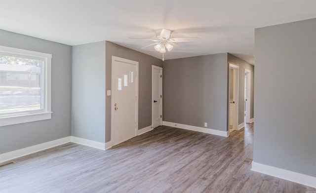 entrance foyer featuring light hardwood / wood-style floors and ceiling fan