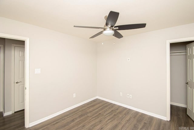 unfurnished bedroom with a closet, ceiling fan, and dark hardwood / wood-style floors