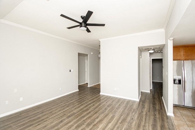 spare room featuring ceiling fan, dark hardwood / wood-style floors, and ornamental molding