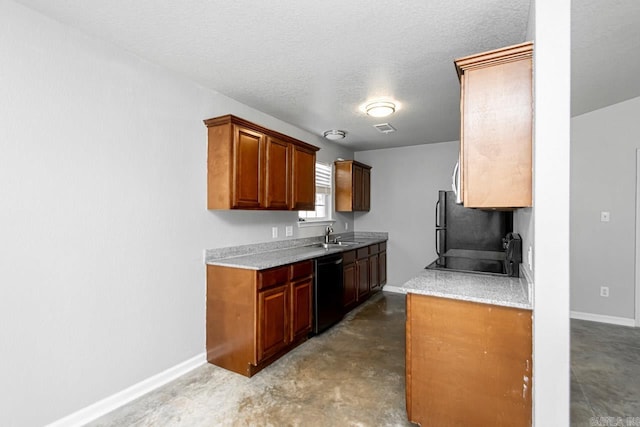 kitchen with black appliances, a textured ceiling, and sink