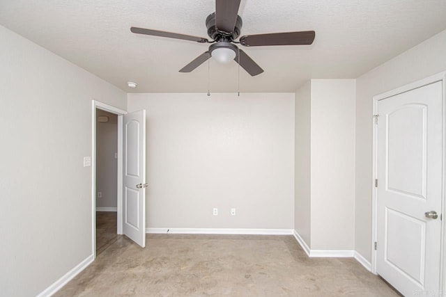 unfurnished bedroom with a textured ceiling, light carpet, and ceiling fan