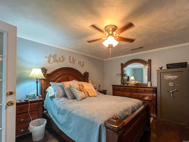 bedroom featuring a textured ceiling, crown molding, and ceiling fan