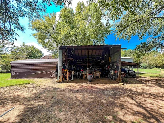 view of outdoor structure featuring a carport