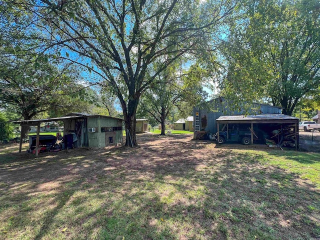 view of yard featuring a carport