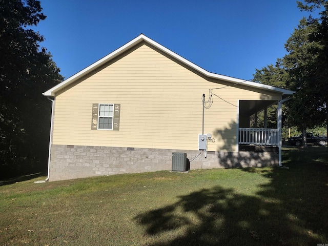 view of property exterior with a yard