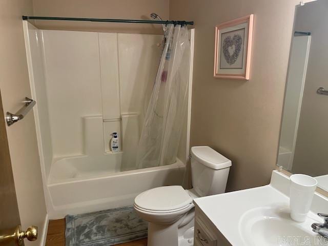 full bathroom featuring shower / bath combination with curtain, vanity, and toilet