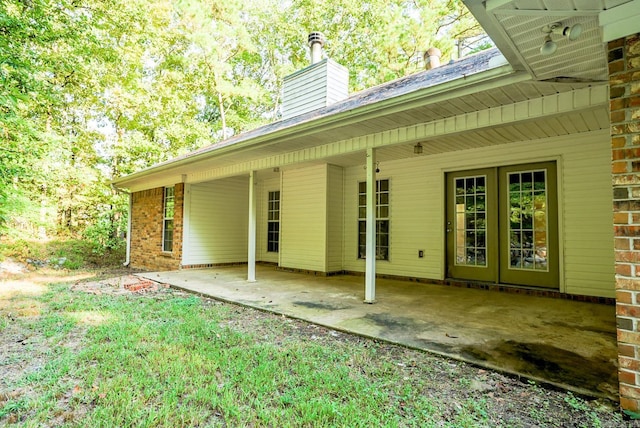 back of house with a patio