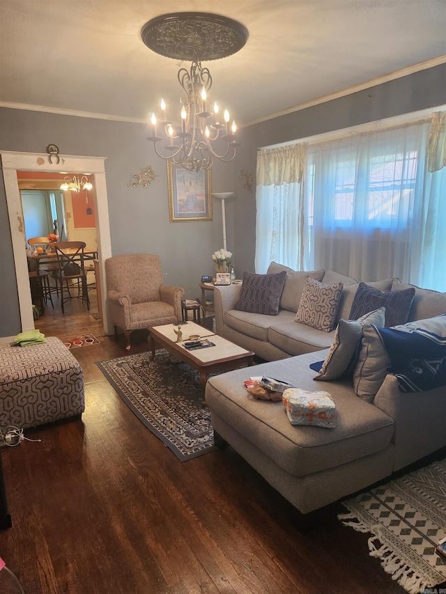 living area featuring a notable chandelier and wood finished floors