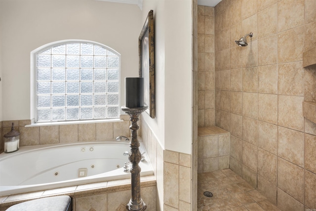 bathroom featuring separate shower and tub and plenty of natural light