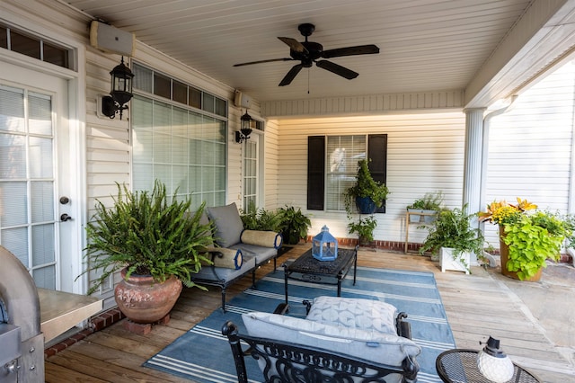 exterior space featuring an AC wall unit, ceiling fan, and covered porch