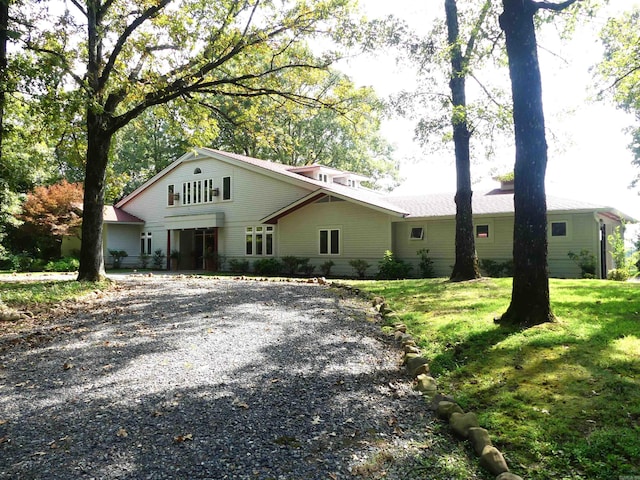 view of property featuring a front yard