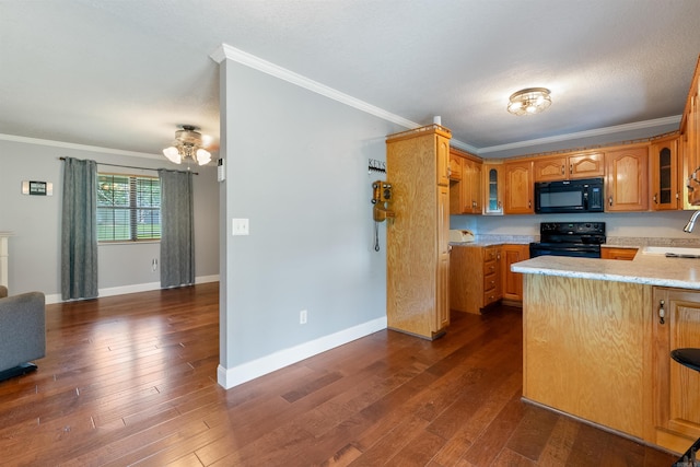 kitchen with ornamental molding, sink, dark hardwood / wood-style flooring, and black appliances