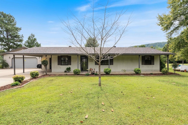 ranch-style home with a front yard, a garage, and a porch