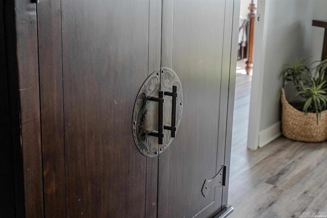 interior details with hardwood / wood-style flooring