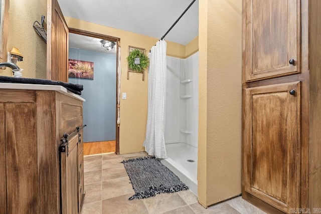 bathroom with a shower with curtain