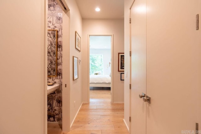 hallway featuring light hardwood / wood-style floors