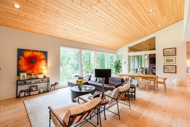 living room with wooden ceiling, light hardwood / wood-style floors, and high vaulted ceiling