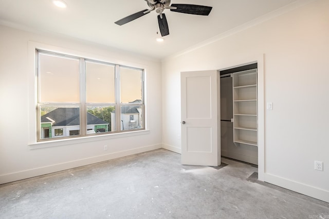 unfurnished bedroom with a closet, crown molding, and ceiling fan