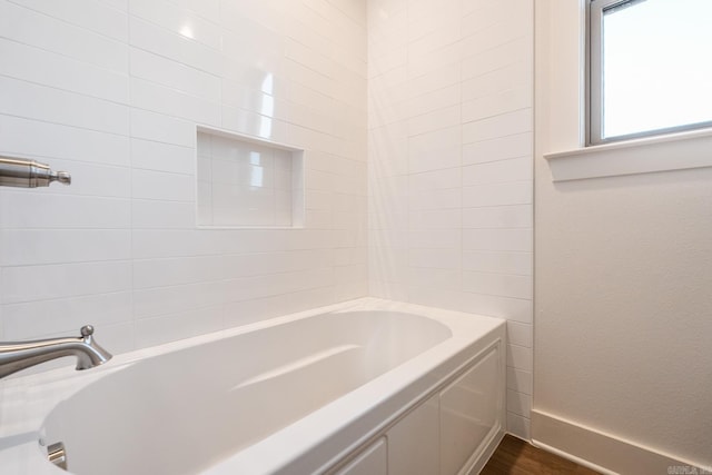 bathroom with a bathing tub