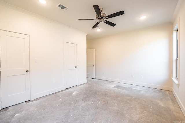 unfurnished bedroom featuring ceiling fan