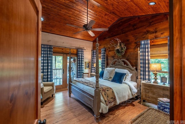 bedroom with ceiling fan, lofted ceiling, wooden ceiling, light wood-type flooring, and access to exterior