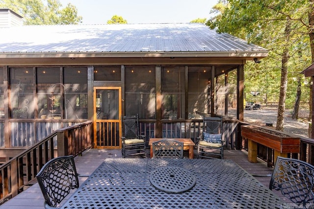 deck featuring a sunroom