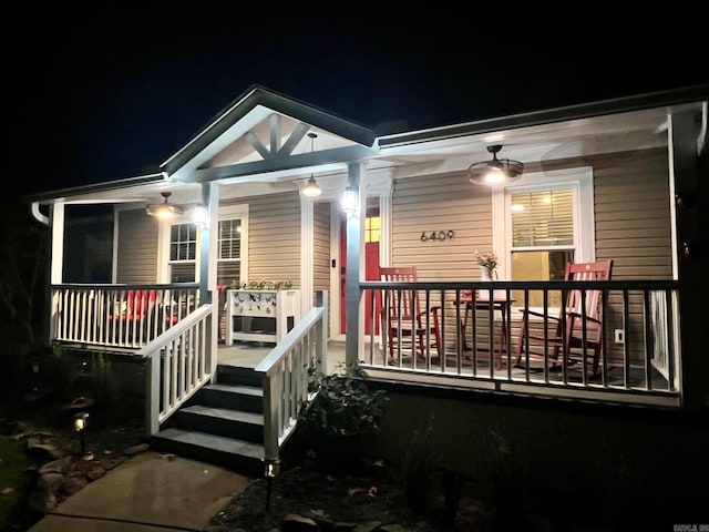 exterior space featuring ceiling fan and covered porch