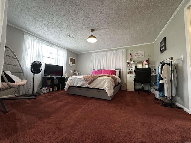 carpeted bedroom with a textured ceiling and crown molding