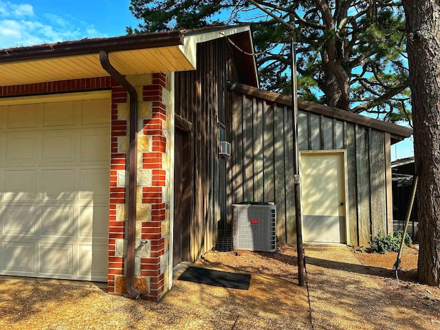 view of outbuilding featuring central AC