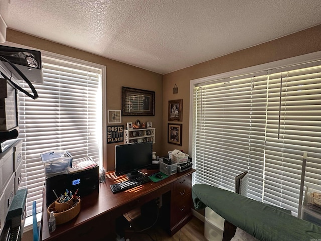 office area featuring a textured ceiling