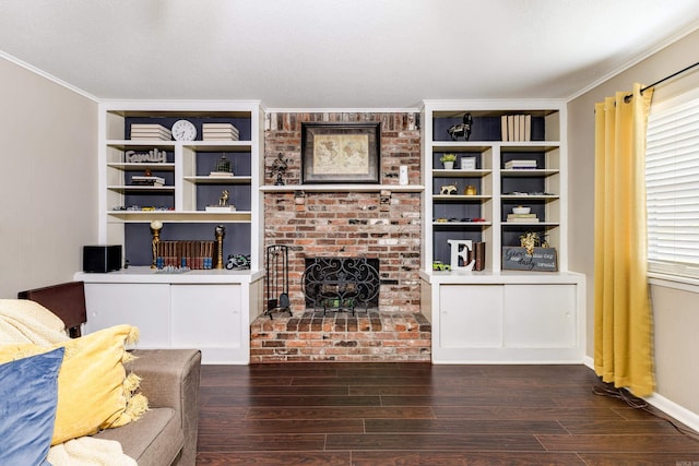 living room featuring crown molding, a fireplace, and dark hardwood / wood-style flooring