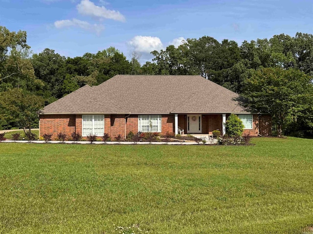 single story home with a front yard