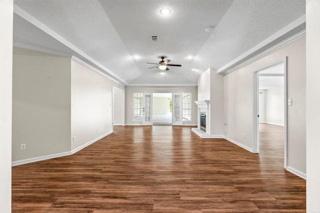 unfurnished living room featuring ceiling fan, lofted ceiling, and dark hardwood / wood-style floors