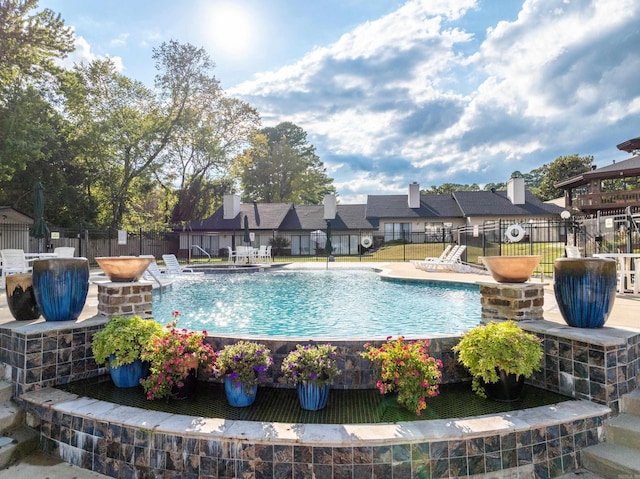 5371 Central Ave Unit 1B, Hot Springs, AR 72210 - community pool with fence, a residential view, and a patio area